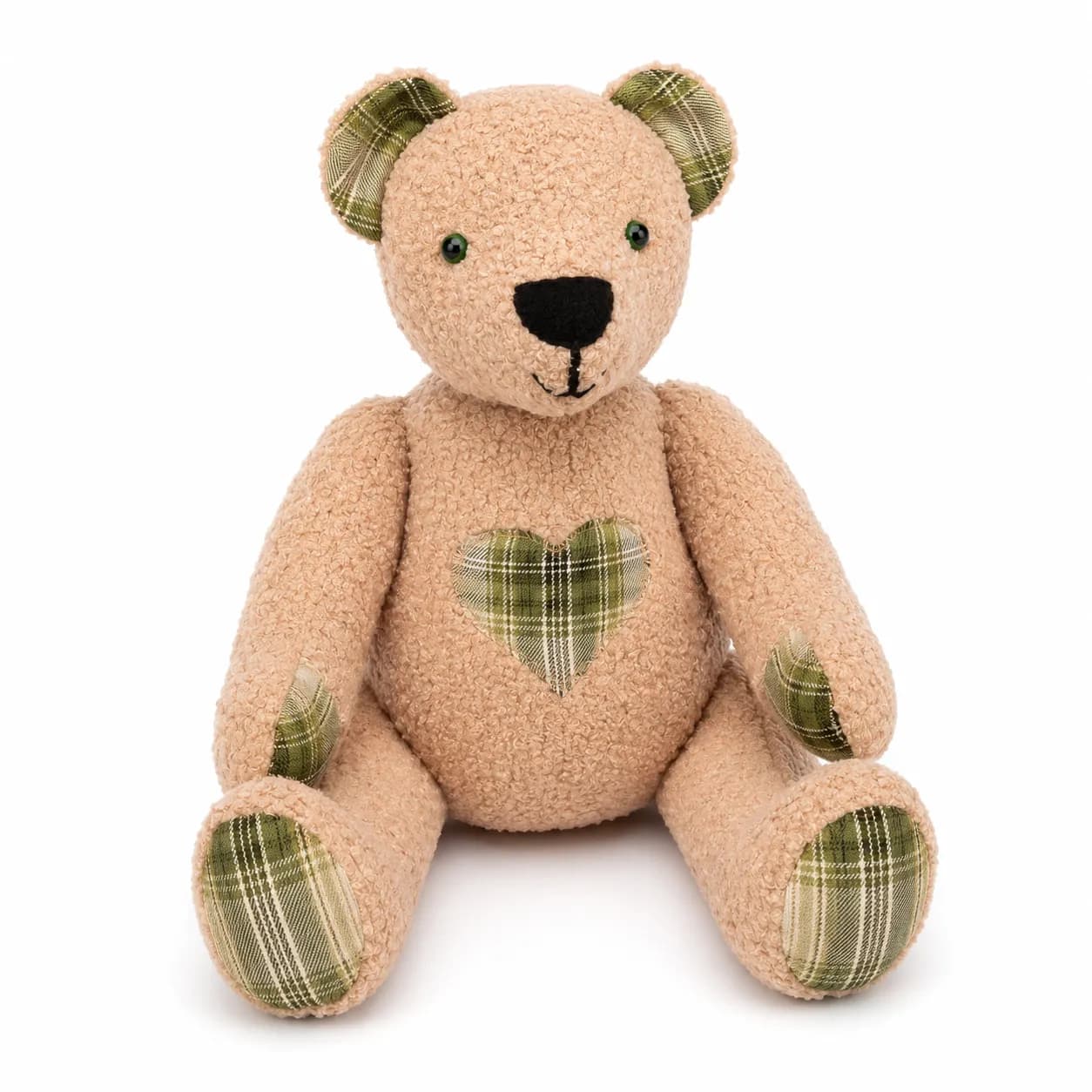 Tan memory bear with a green plaid heart sewn on its chest
